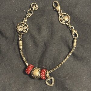 Brighton bracelet and charms. Just been cleaned at jewelry store. Beautiful set.